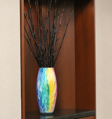 An image of the interior of the Steinberg Garellek office in Boca raton with rainbow vase.