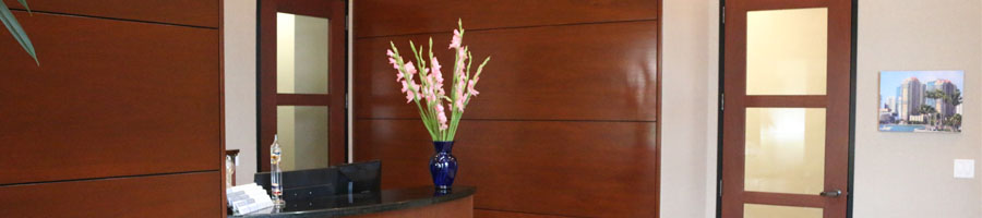 An image of the front desk of the office at Steinberg Garellek law firm in Boca Raton.